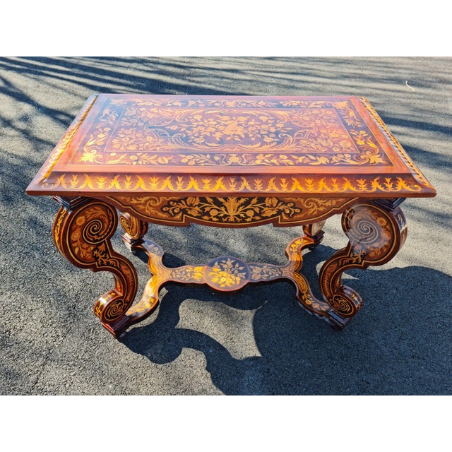 Impressive beautiful French style table/desk , the rectangular top decorated with flowering urn inlay ; on scrolled legs...
