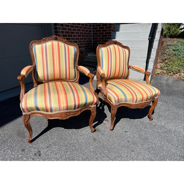A Fine Pair Of Carved Oak French Louis XV Styled Fauteuils By Don Ruseau, 1960’s Made by the Don Ruseau furniture company...