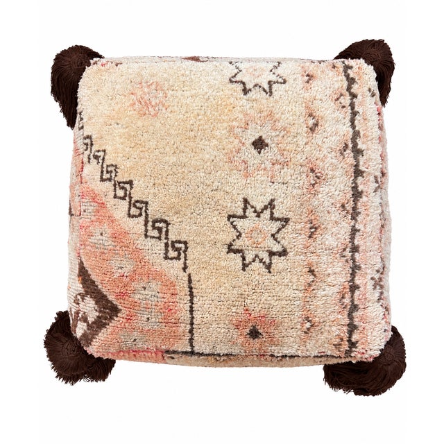 Moroccan floor pouf made from an abstract midcentury rug handwoven in beige, brown and coral hand spun wool. Handcrafted...
