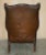 Vintage Pair of Chesterfield Chestnut Brown Leather Wingback Armchairs & Footstools For Sale - Image 12 of 18