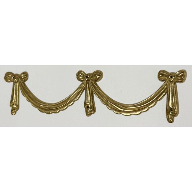 French Provincial style brass decorative swag applique/embellishment featuring triple bow motif with ribbon swags.Perfect...