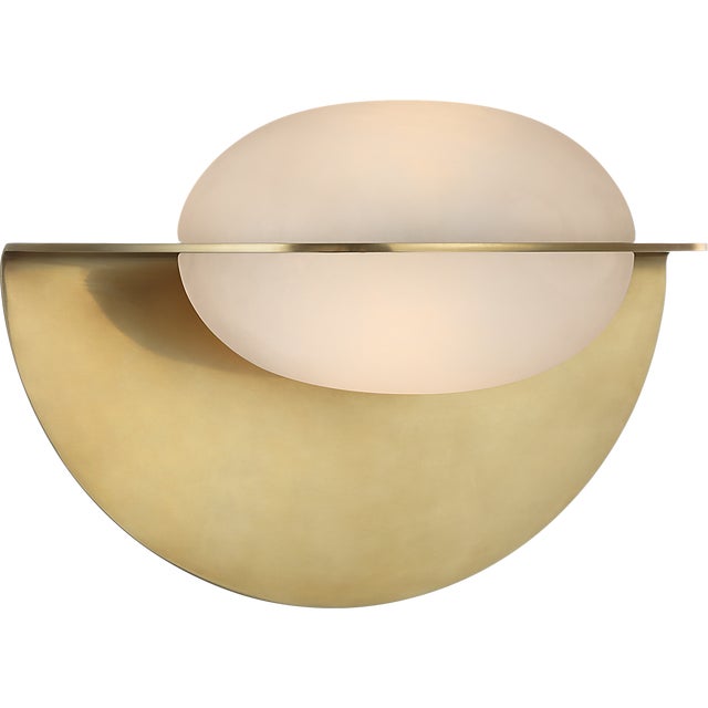 Fosse 9" Invertable Oval Sconce in Antique-Burnished Brass with Alabaster Designer: Kelly Wearstler Finish: Antique-...