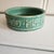 Rare Mcoy heavy stoneware Dog food bowl. Reads "mans best friend his dog"