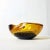 Organic shaped 1960's glass bowl in two colors from Murano with air-bubble pattern. Excellent for putting your keys and...