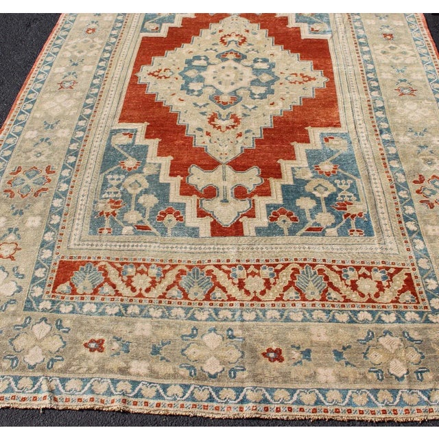 Textile Medallion Vintage Turkish Oushak Turkish in Mid-Century Modern Red, Cream and Light Blue For Sale - Image 7 of 13