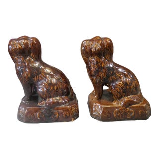 Pair of Circa 1860 American Stoneware Pottery Rockingham Glaze Spaniel Doorstops/Mantel Dogs For Sale