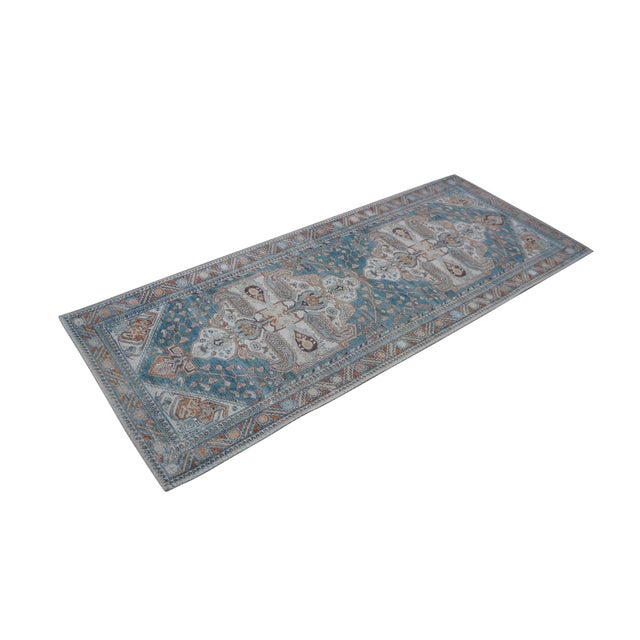 Late 20th century carpet runner / mat. Traditional geometric and floral design in turquoise, rust and beige. Dimensions:...