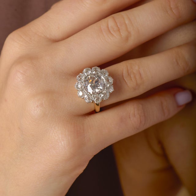 This magnificent Victorian cluster ring is a breathtaking example of turn-of-the-century diamond artistry, where scale,...