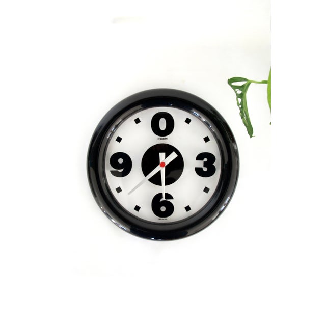 The wall clock designed by Studio STG for Guzzini in the 1980s is a striking example of Italian postmodern design....