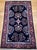 "This vintage Persian Sarouk area rug from the third quarter of the 20th century presents the refined allover floral...