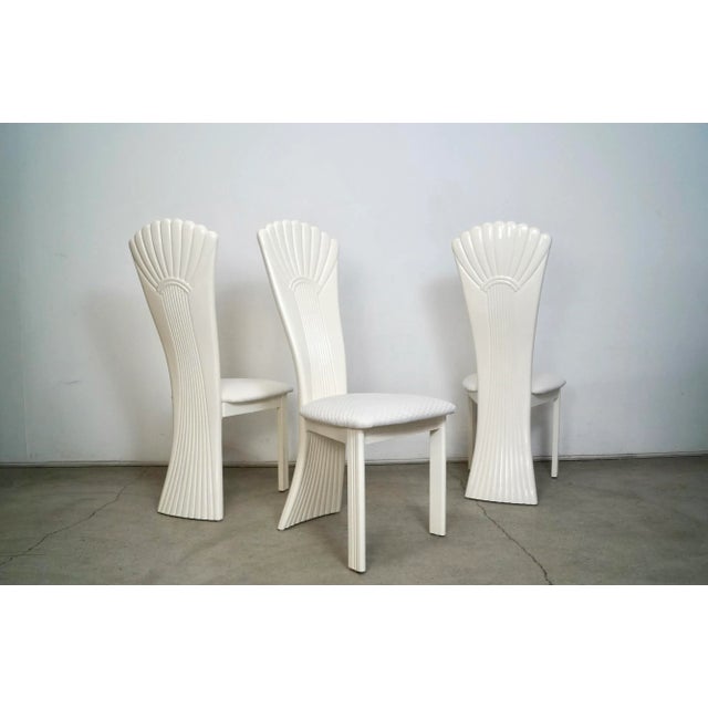 Set of 3 Hollywood Regency dining chairs for sale. Vintage post modern chairs that were manufactured in the 1980's, and...