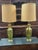 A beautiful pair of large Royal Haeger mcm table lamps. In a fluted form body with brass bases. Great avocado green with...