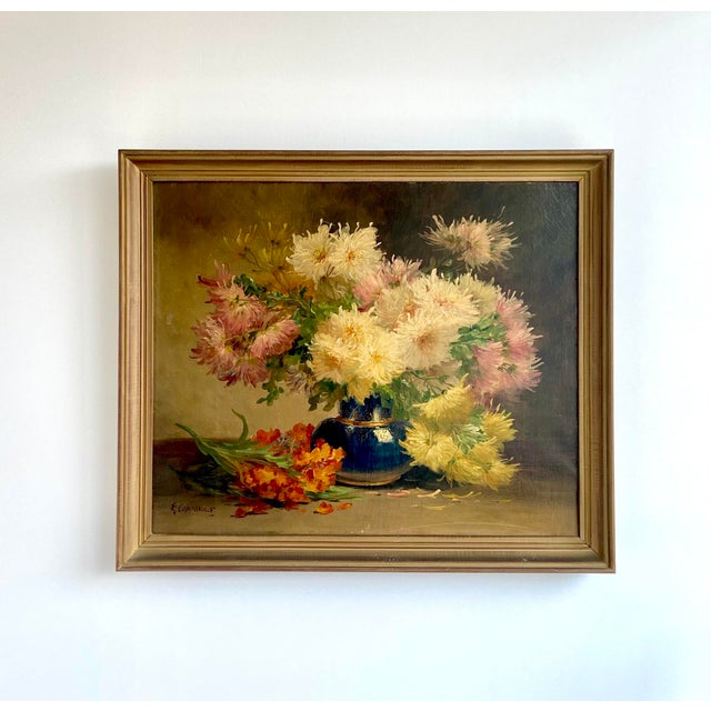 Elegant antique floral still life by edmond van coppenolle, signed “e. Coppenolle” lower left. the painting depicts a...