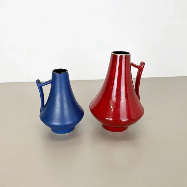 Article: Set of two fat lava art vases Model: 44/25 44/20 Producer: Jopeko Ceramics, Germany Decade: 1970s These original...