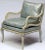 Originally purchased at Marshall Field and Company's State Street store in the 1940s, these carved wood club chairs are...