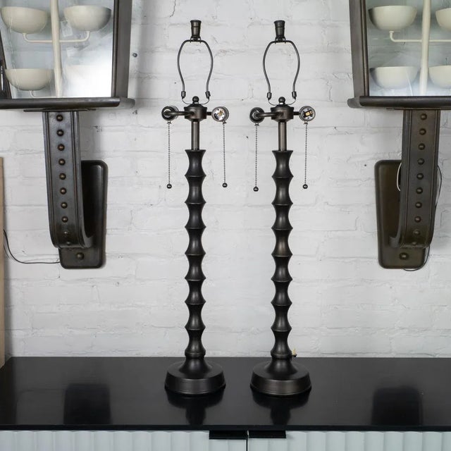 Pair of dark bronze finish, turned metal faux bamboo table lamps.