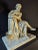 Beautifully-detailed statue, possibly of the philosopher Socrates, originally designed to sit atop a grand clock. Mid-to-...