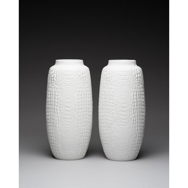 Crocodile relief biscuit porcelain vase duo – manfred frey for ak kaiser, 1970s a pair of tall biscuit porcelain vases...