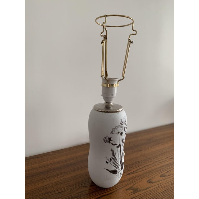 Stig Lindberg 'Grazia' Table Lamp for Gustavsberg, Sweden, 1960s, Signed White glaze, silver-plated decoration with plant...