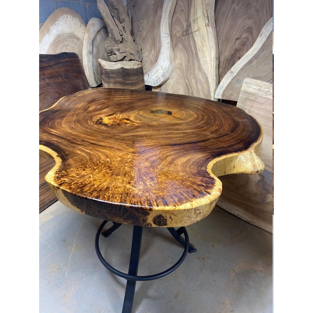 Looking for the perfect piece to complete your home bar or man cave? Let us help you with this one of a kind live edge...