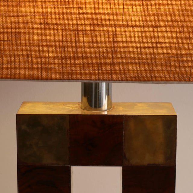 A stunning mid-century table lamp, made in Italy during the 1970s. This piece perfectly embodies the elegant and...