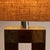 A stunning mid-century table lamp, made in Italy during the 1970s. This piece perfectly embodies the elegant and...