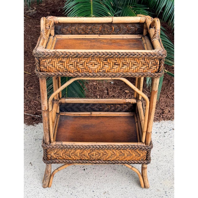 This 2 tiered rattan table is great as side table or nightstand. Sturdy and well made. You can leave your magazines on the...