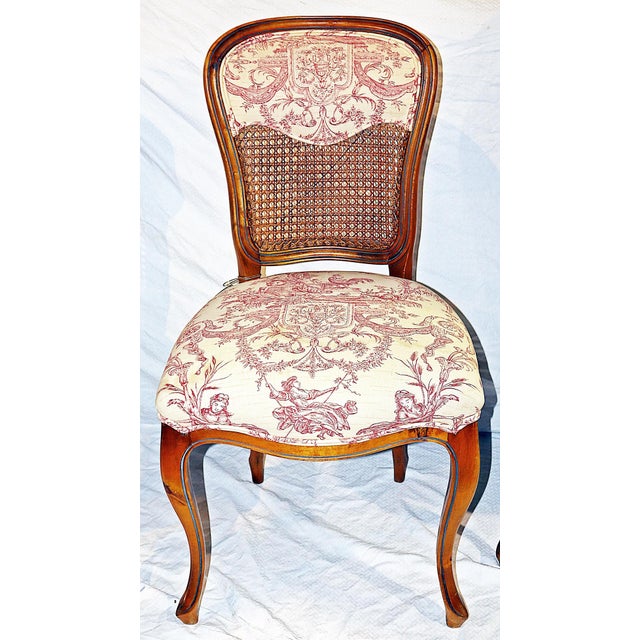 Adorable set of 4 caned balloon back French country dining chairs in a very rare wild cherry wood (cerisie in French),...