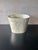Vintage coastal wastebasket dating to the 1980s, handcrafted from natural capiz shell. Features a softly rounded...