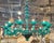 The Modern Murano Teal Glass Chandelier is a stunning and stylish lighting fixture that adds a touch of elegance to any...