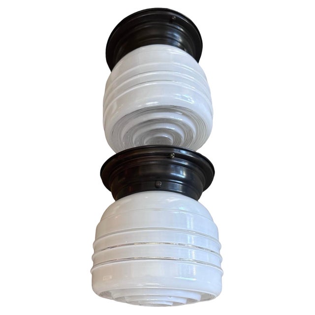 These are great fixtures! The white glass with the clear rings about the glass as well as at the bottom, makes these nice...