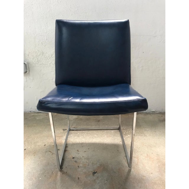 Pair of Iconic thin-line dining chairs designed by Milo Baughman for Thayer Coggin. Two Pairs available.