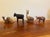 Bring warmth and character to a shelf, tabletop, or curated vignette with this delightful collection of nine hand-carved...