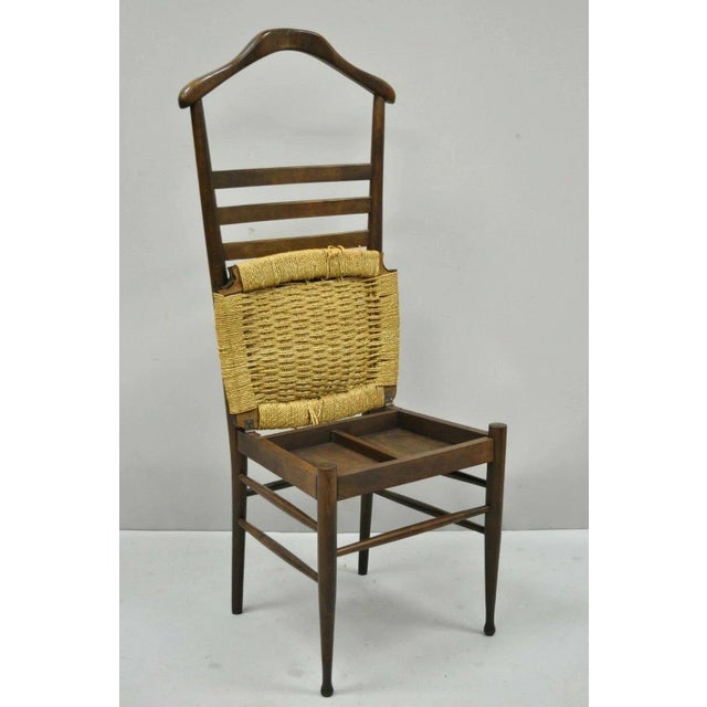 Vintage Mid Century Italian Modern Wood & Rope Clothing Valet Butlers Chair. Item features a woven rope seat, lift up...
