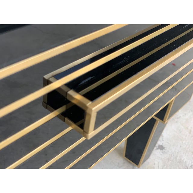 New pair of mirrored nightstands in black mirror and chrome. Beautiful pair of nightstands with mirrored finished drawers...