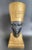 A stunning Egyptian Revival statue of Queen Nefertiti Bust. Crafted from hard resin, finished in gold and black paints....