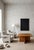 A sober coffee table from the 1960s, crafted from pine wood, representative of the rationalist style where structure and...