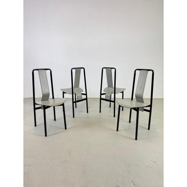 Beautiful set of four Irma chairs, designed by Achille Castiglioni and produced by the Italian company Zanotta. Black...