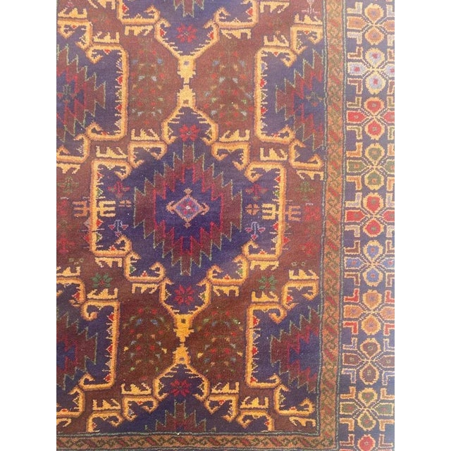 Nice mid century Turkmen Baluch rug with beautiful geometric and tribal design and nice colors, entirely and finely hand...