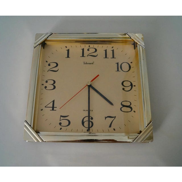 Vintage Art Deco clock for sale. Manufactured in 1987, and very unique. It's made of brass with an Art Deco Hollywood...