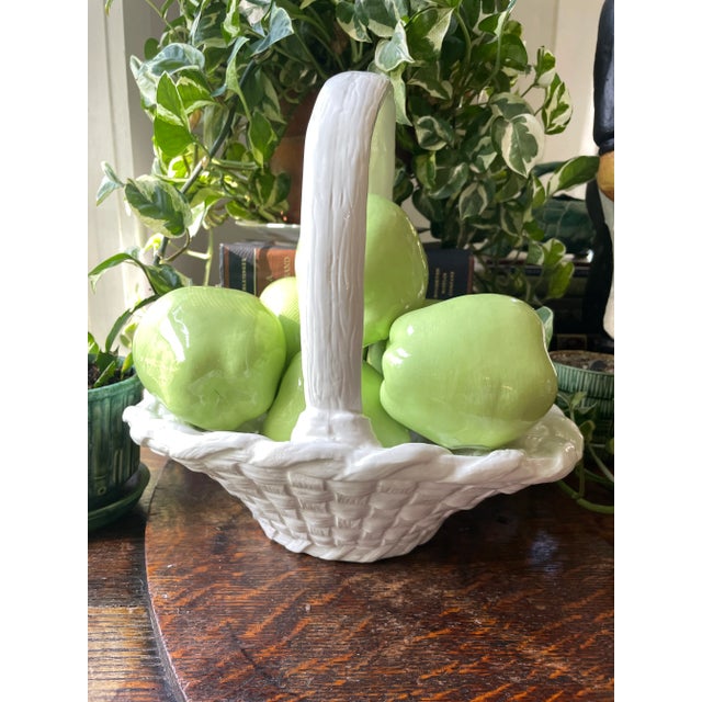 Perfect for spring and summer entertaining! This vintage ceramic Trompe L’oeil basket has a woven pattern and handle and...