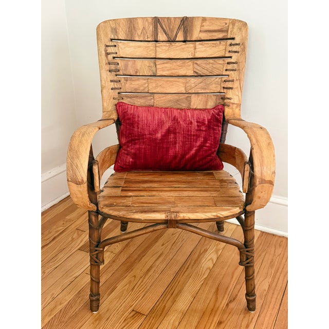 Midcentury Southwestern chair, the structure wrapped in a fibrous tree material with leather and bentwood touches. While...