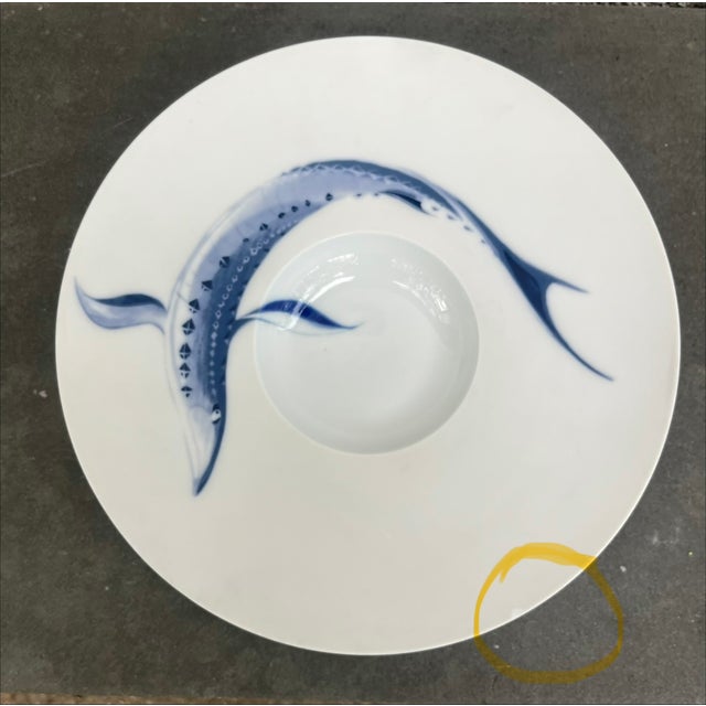 Large wide time porcelain bowl with hand painted sturgeon. The bowl is manufactured by Hering Berlin and features a matte...