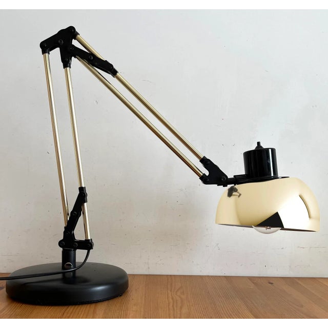 Articulated table lamp two arms that rotates 180 ° arm and hat golden bulb attack and 27 not provided in the sale lamp...