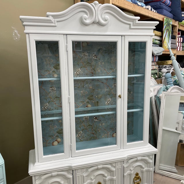 Stunning vintage two piece china cabinet has all the vintage charm plus some! The top portion features one large glass...