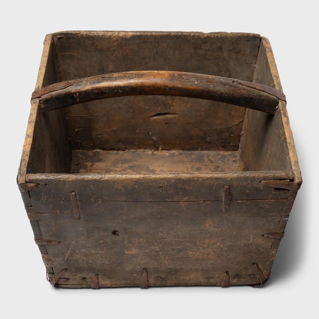 This rustic container was made over a hundred years ago to measure and hold a dou of rice, a traditional Chinese unit of...