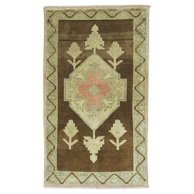 Mid 20th century Turkish rug in brown and neutral tones Measures: 2'3'' x 3'8''.