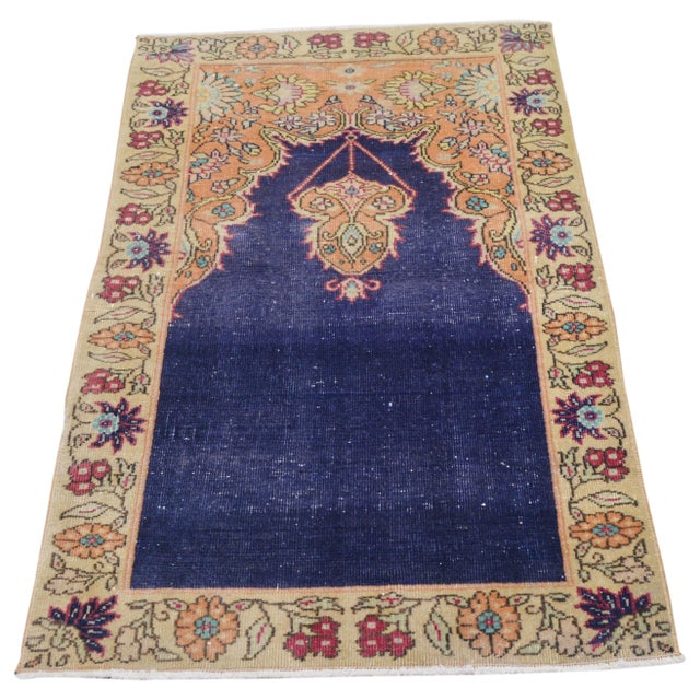 Hand-knotted with care using traditional rug-making techniques, this wool rug blends timeless craftsmanship with a modern...