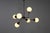 Great looking pair of Stilnovo style chandeliers. Brass frames, black enameled trim, opaque white glass globes. Each light...