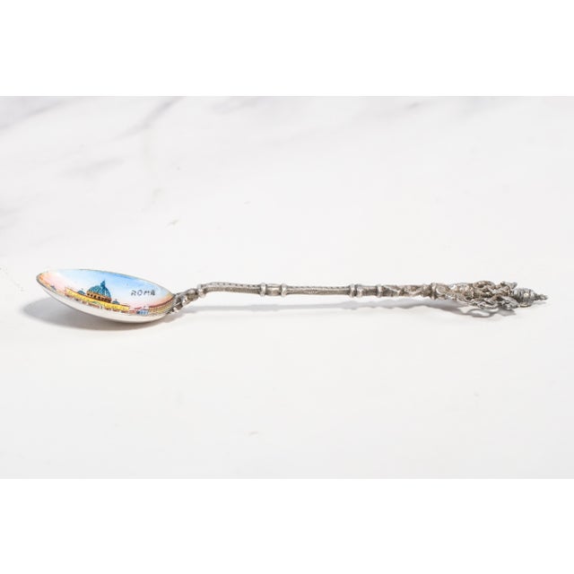 A beautifully detailed example of a classic Grand Tour souvenir, this antique 800 silver spoon captures the romance and...